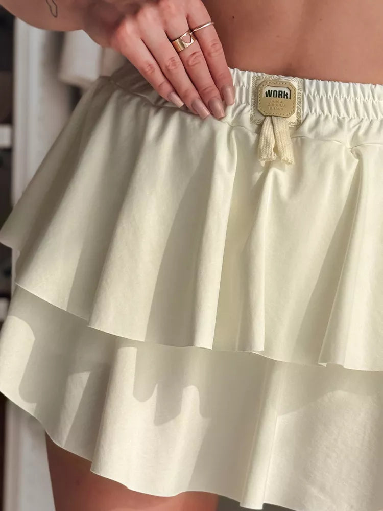 Moteriškas baltas mini sijonas Falbela